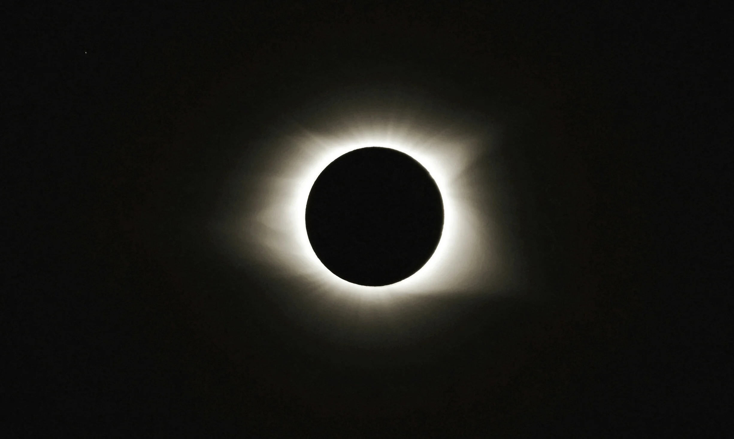 Total solar eclipse against a deep sky.